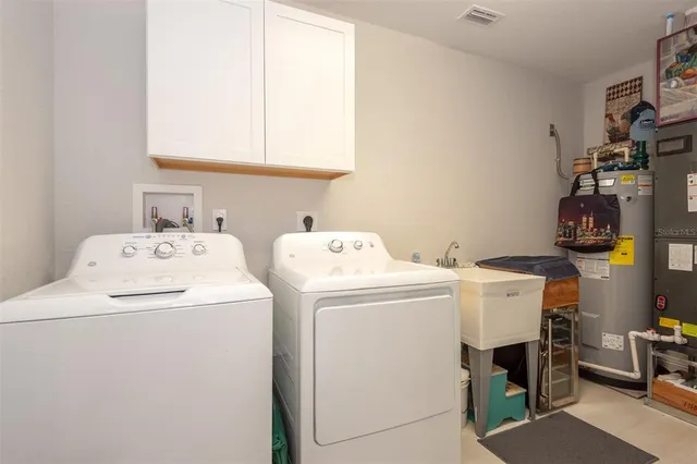 a view of roof deck with patio