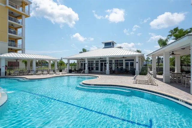 a living room with furniture a rug and a window