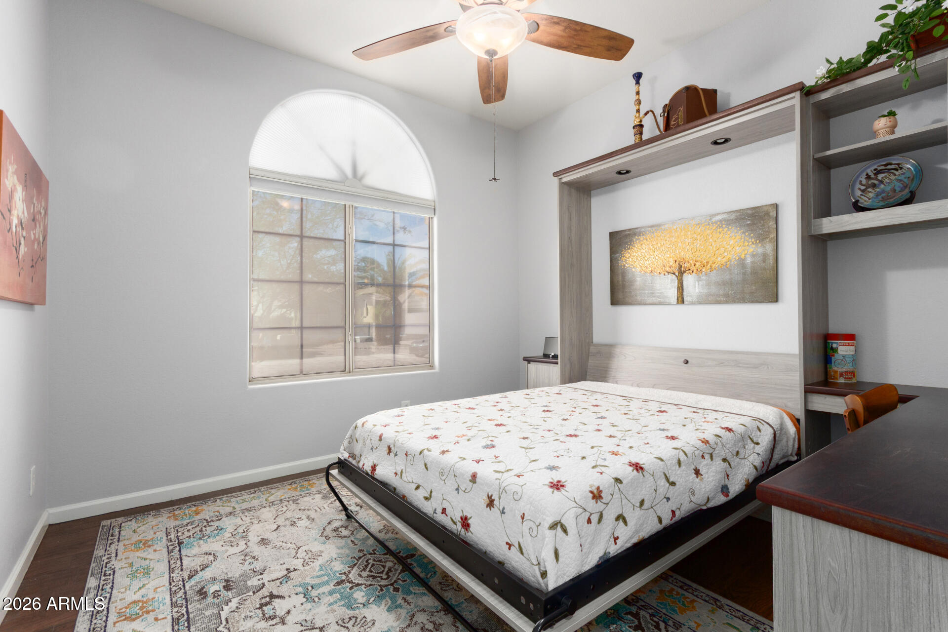 21009 North 16th Way Phoenix, AZ 85024 - Photo 29 of 39 a bedroom with a bed and a window