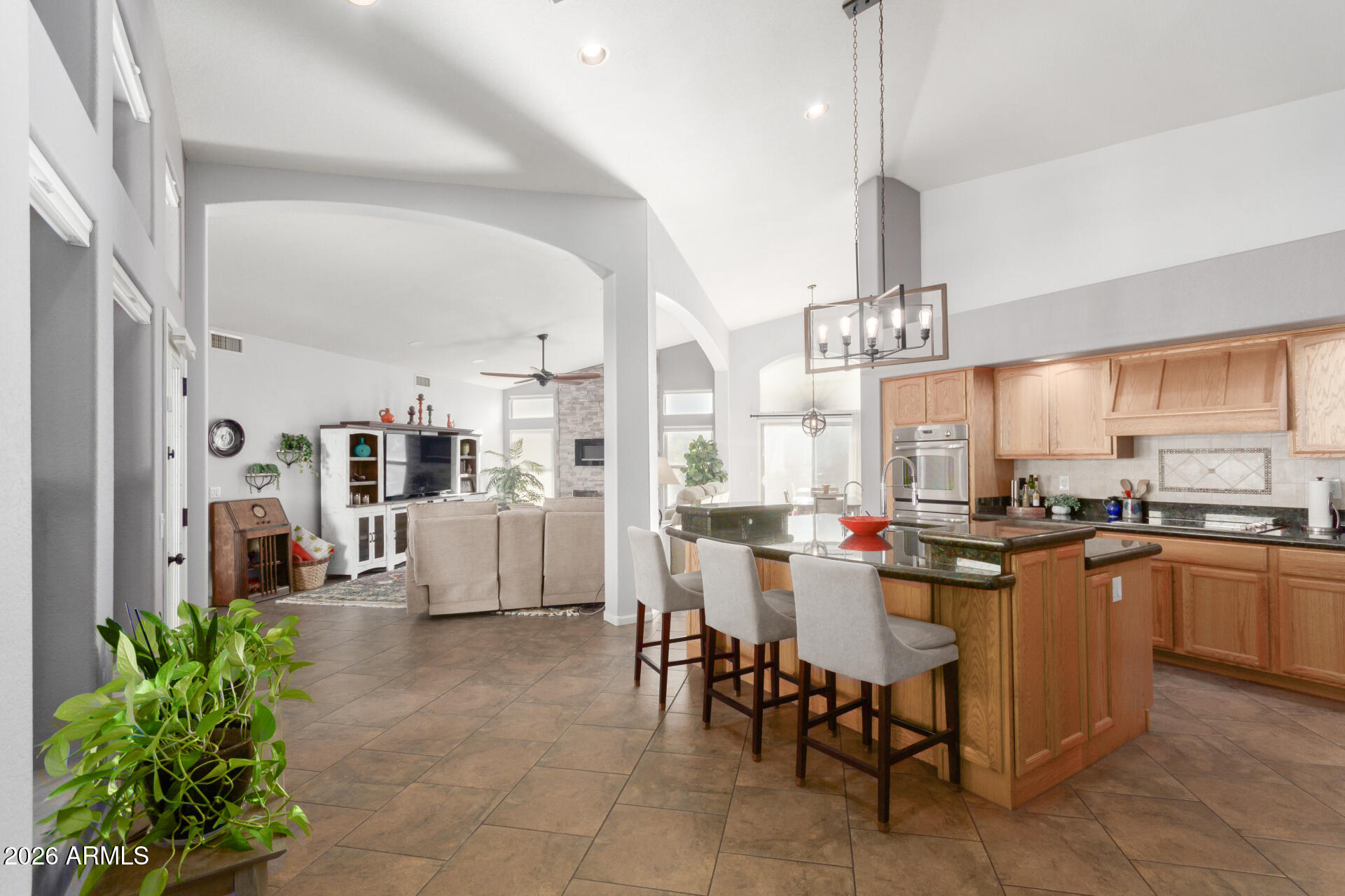 21009 North 16th Way Phoenix, AZ 85024 - Photo 8 of 39 a large kitchen with a table and chairs