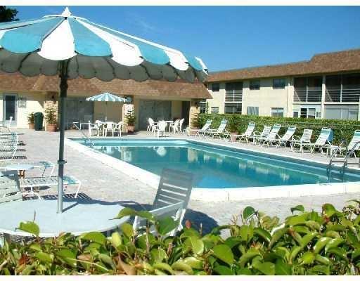 9855 Sandalfoot Boulevard, Unit 303 Boca Raton, FL 33428 - Photo 3 of 10 Pool - Close View