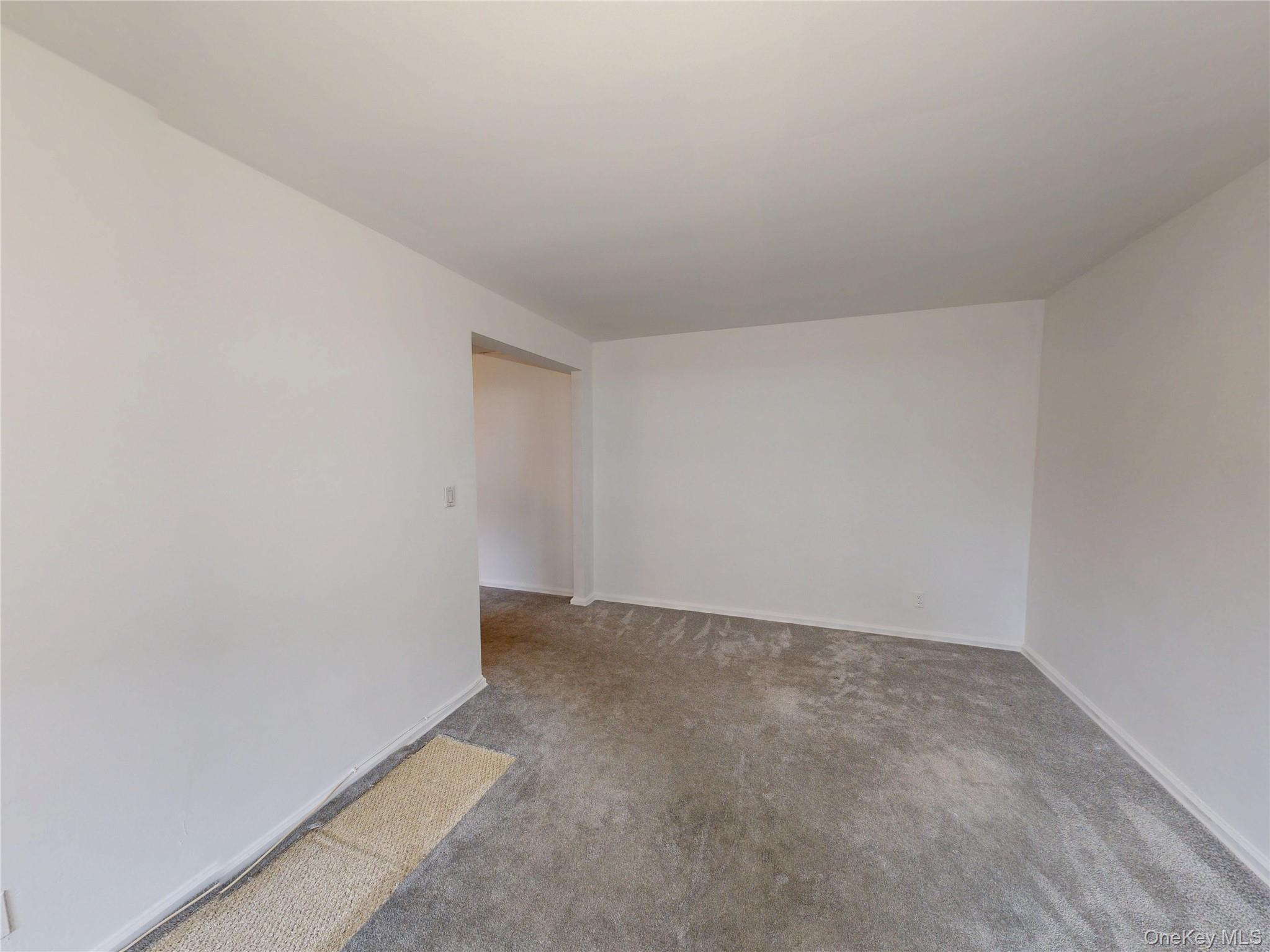61 White Oak Street, Unit 3A New Rochelle, NY 10801 - Photo 10 of 12 a view of an empty room