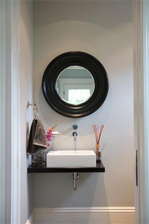 19 Cushing Road Wellesley, MA 02481 - Photo 15 of 29 a bathroom with a sink and a mirror