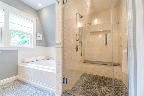 19 Cushing Road Wellesley, MA 02481 - Photo 18 of 29 a bathroom with a sink a toilet and shower