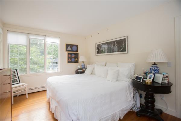 19 Cushing Road Wellesley, MA 02481 - Photo 21 of 29 a bedroom with a bed and a large window