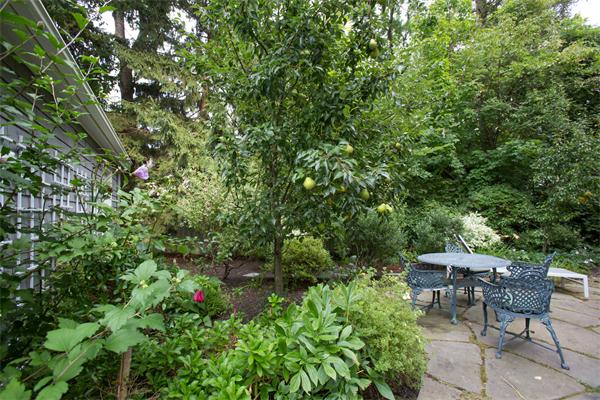 19 Cushing Road Wellesley, MA 02481 - Photo 27 of 29 a backyard of a house with outdoor seating
