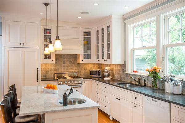 19 Cushing Road Wellesley, MA 02481 - Photo 5 of 29 a kitchen with granite countertop a sink a counter space appliances and cabinets