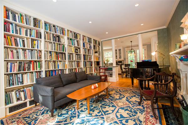 19 Cushing Road Wellesley, MA 02481 - Photo 9 of 29 a living room with furniture and a book shelf