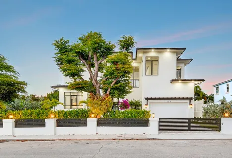 front view of a house with a street