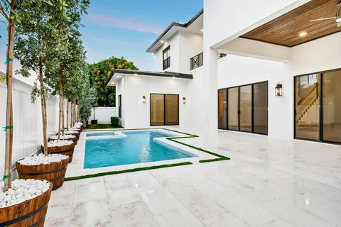 a front view of house with garden