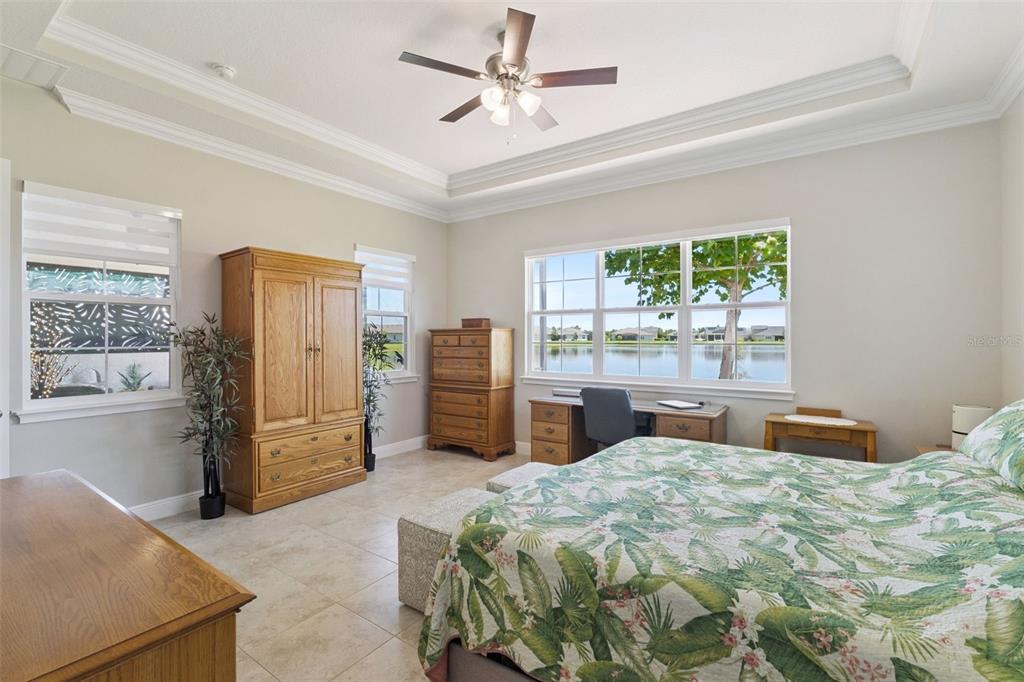 2665 Meadowedge Loop St. Cloud, FL 34772 - Photo 31 of 53 a bedroom with a bed dresser and a window
