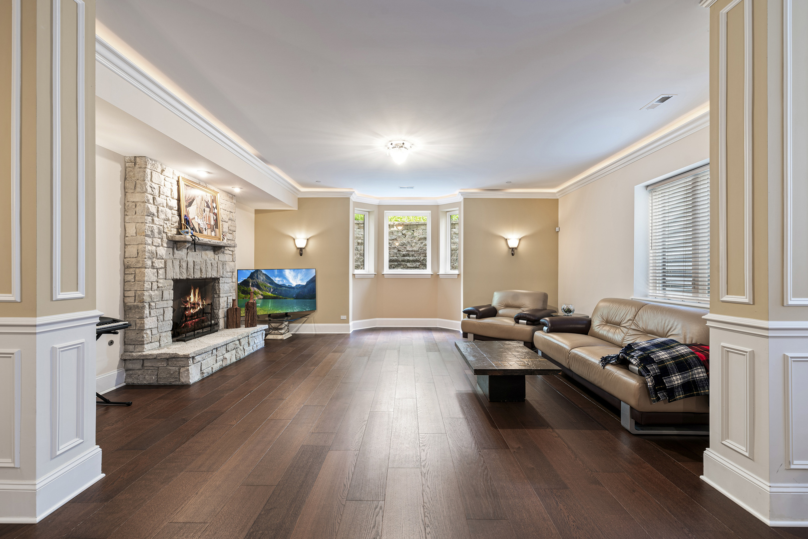 3372 Lakeside Avenue Northbrook, IL 60062 - Photo 31 of 41 a living room with furniture and a fireplace
