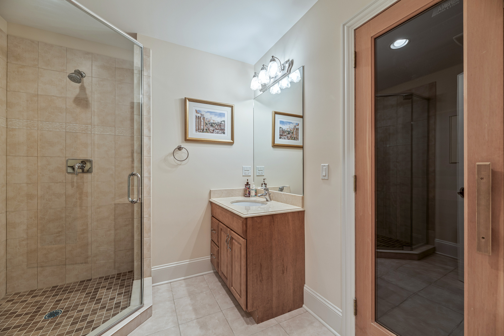 3372 Lakeside Avenue Northbrook, IL 60062 - Photo 34 of 41 a bathroom with a sink mirror and shower