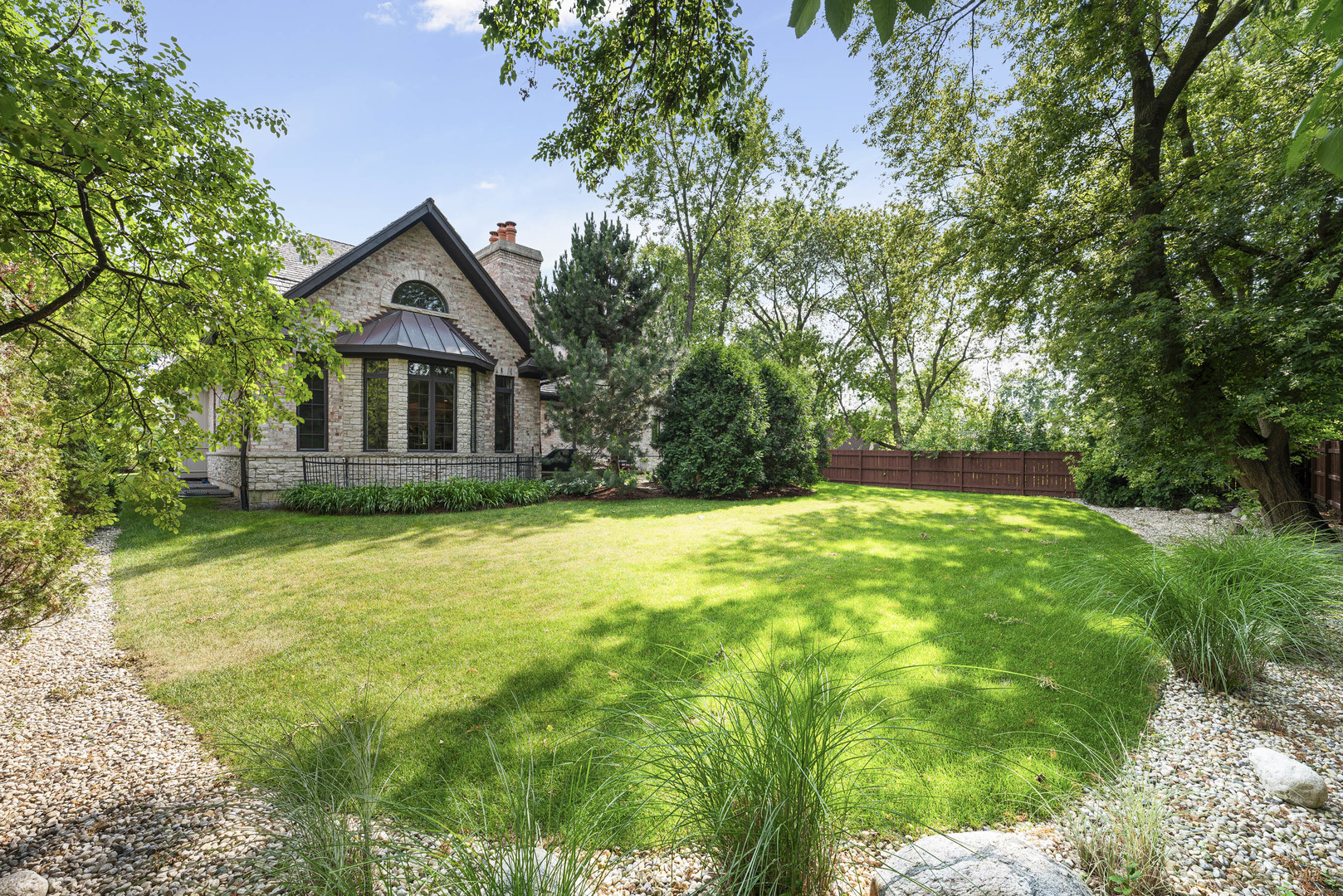 3372 Lakeside Avenue Northbrook, IL 60062 - Photo 36 of 41 a front view of a house with yard and green space