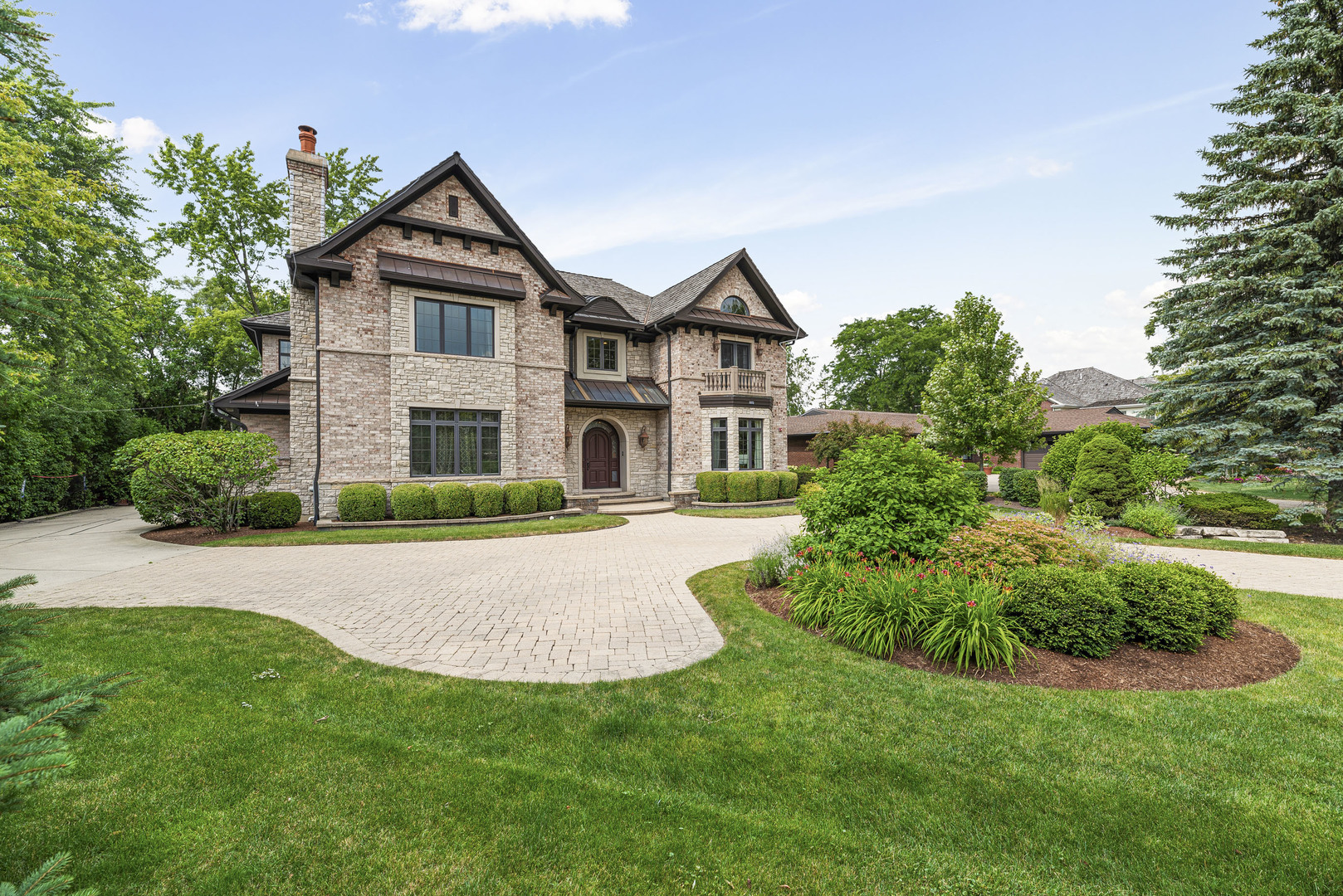 3372 Lakeside Avenue Northbrook, IL 60062 - Photo 38 of 41 a front view of a house with a yard and garage