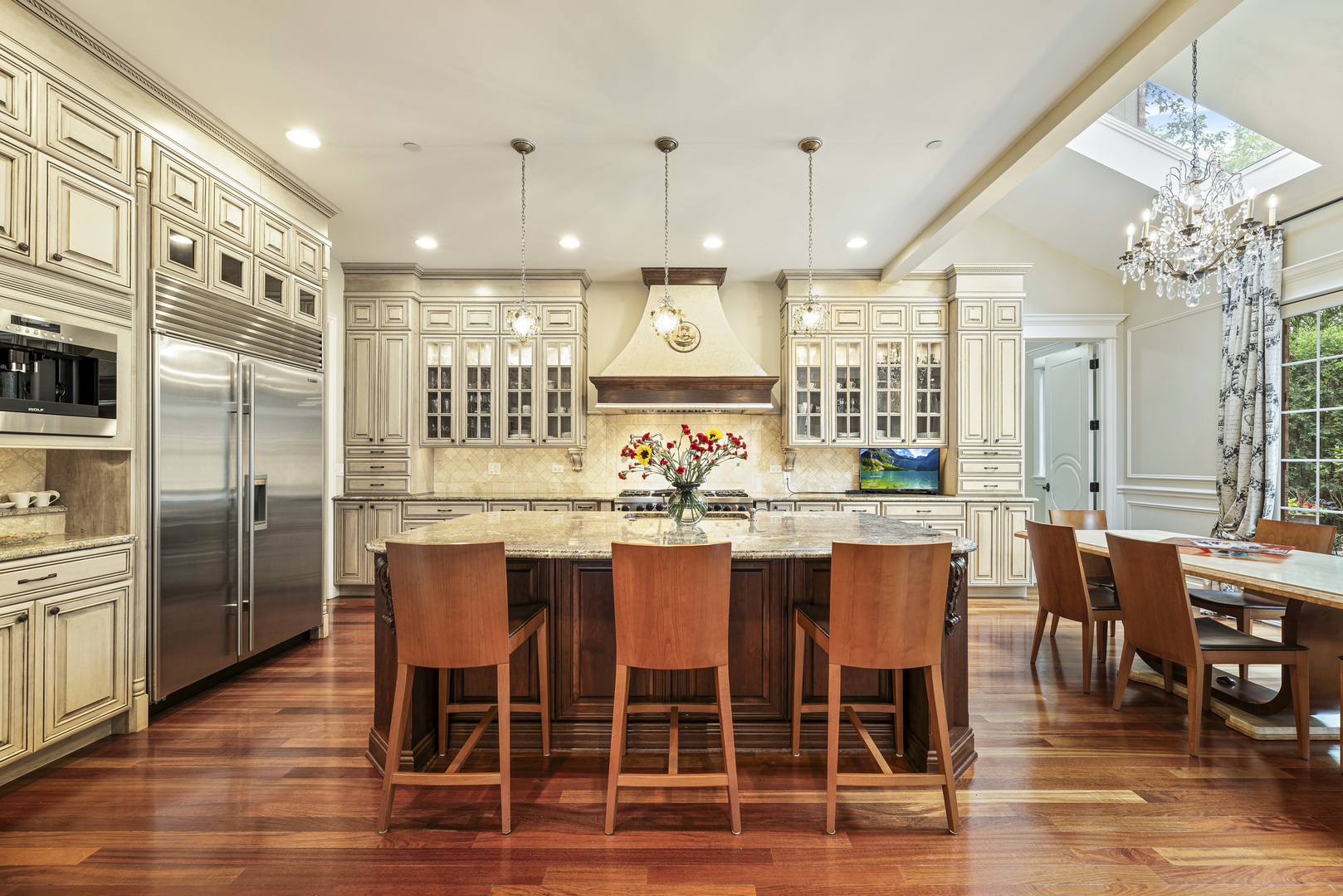 3372 Lakeside Avenue Northbrook, IL 60062 - Photo 9 of 41 a large kitchen with a table and chairs