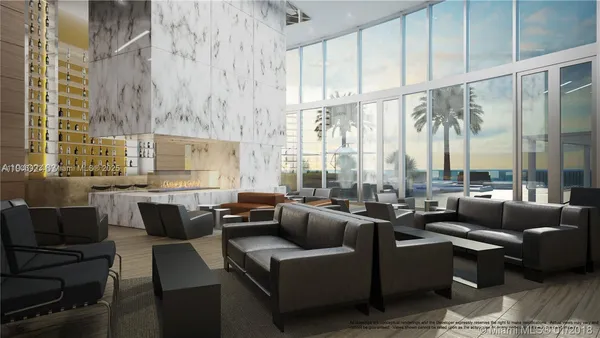 a living room with furniture city view and large windows