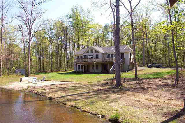 a house with trees in front of it