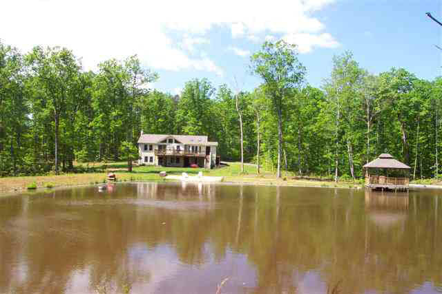2395 Paddock Wood Road Keswick, VA 22947 - Photo 2 of 5 a view of a swimming pool with a patio