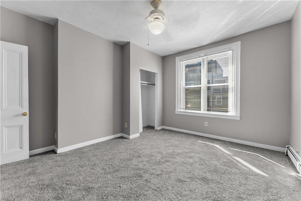 1815 Wharton Street Pittsburgh, PA 15203 - Photo 7 of 15 an empty room with windows