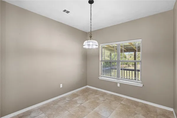 a front view of house with yard outdoor seating and barbeque oven