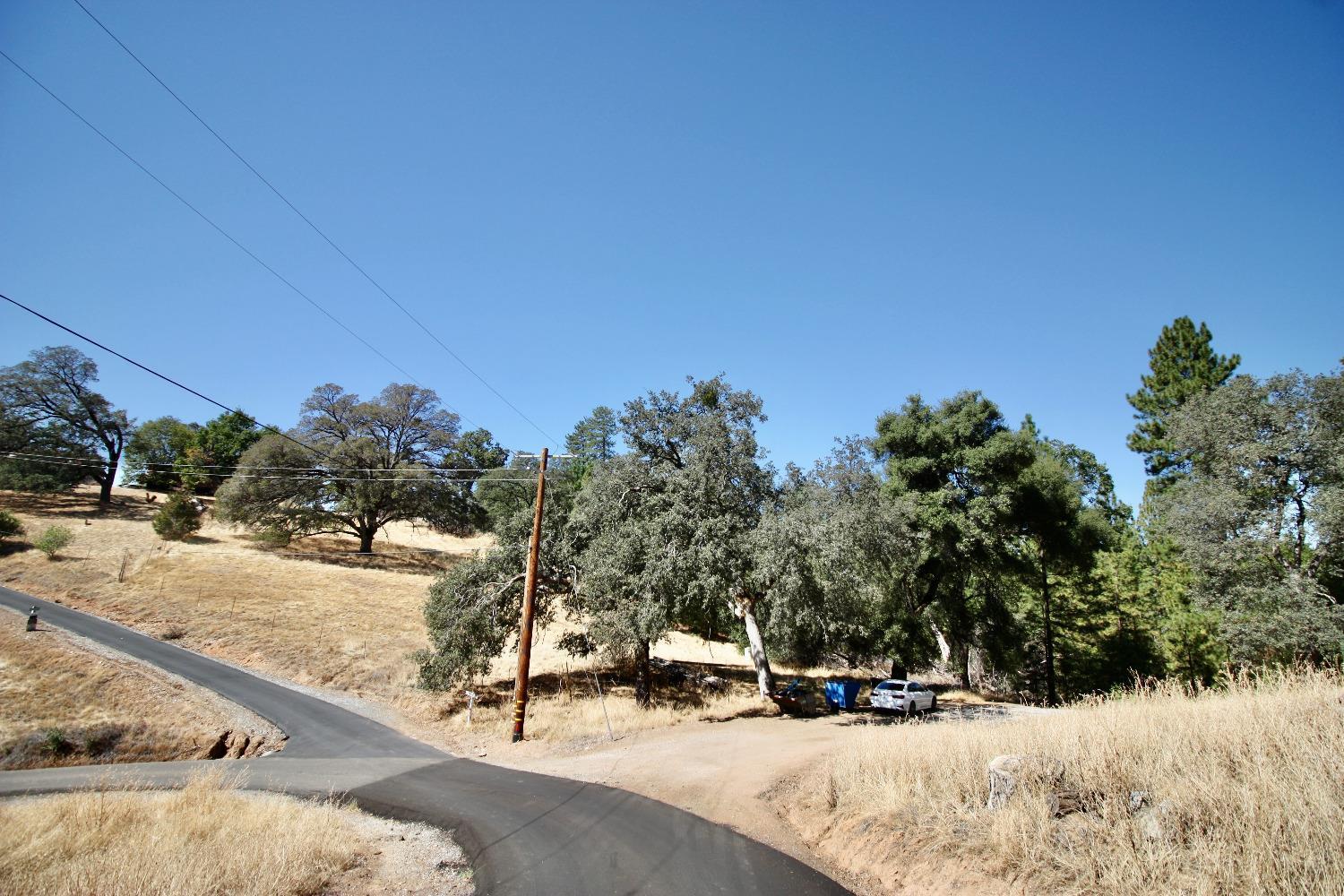 6923 Sagittarius Road Placerville, CA 95667 - Photo 11 of 13 a view of road with trees