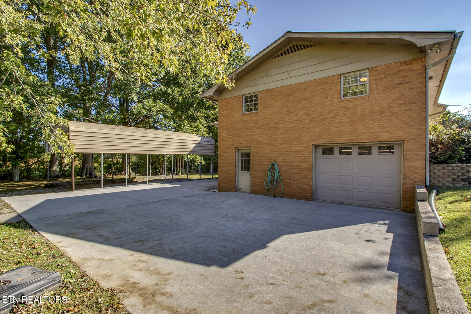 360 Church Street Decatur, TN 37322 - Photo 36 of 60 36_ChurchLane_360_Garage1Patio02