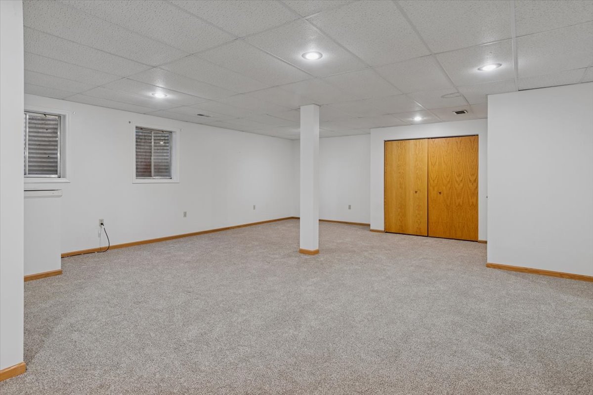 20928 West Spruce Lane Plainfield, IL 60544 - Photo 15 of 20 an empty room with a empty space and windows