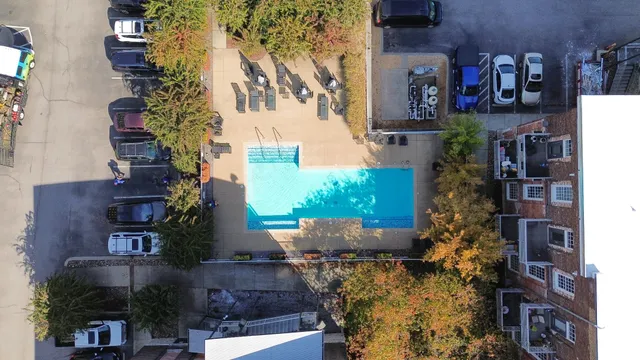a view of a garden with a house