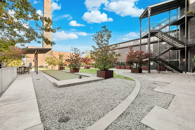 a view of a swimming pool with a lounge chairs