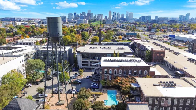 an aerial view of a city with streets and houses