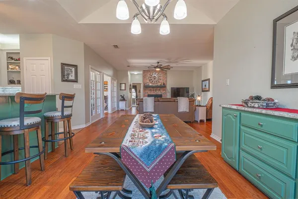 a very nice looking dining room with a dining table