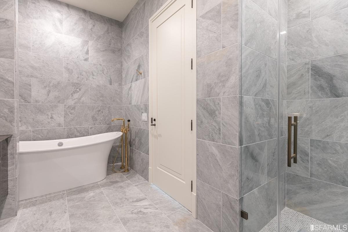 288 Pacific Avenue, Unit 2H San Francisco, CA 94111 - Photo 16 of 34 a view of a bathtub in a bathroom