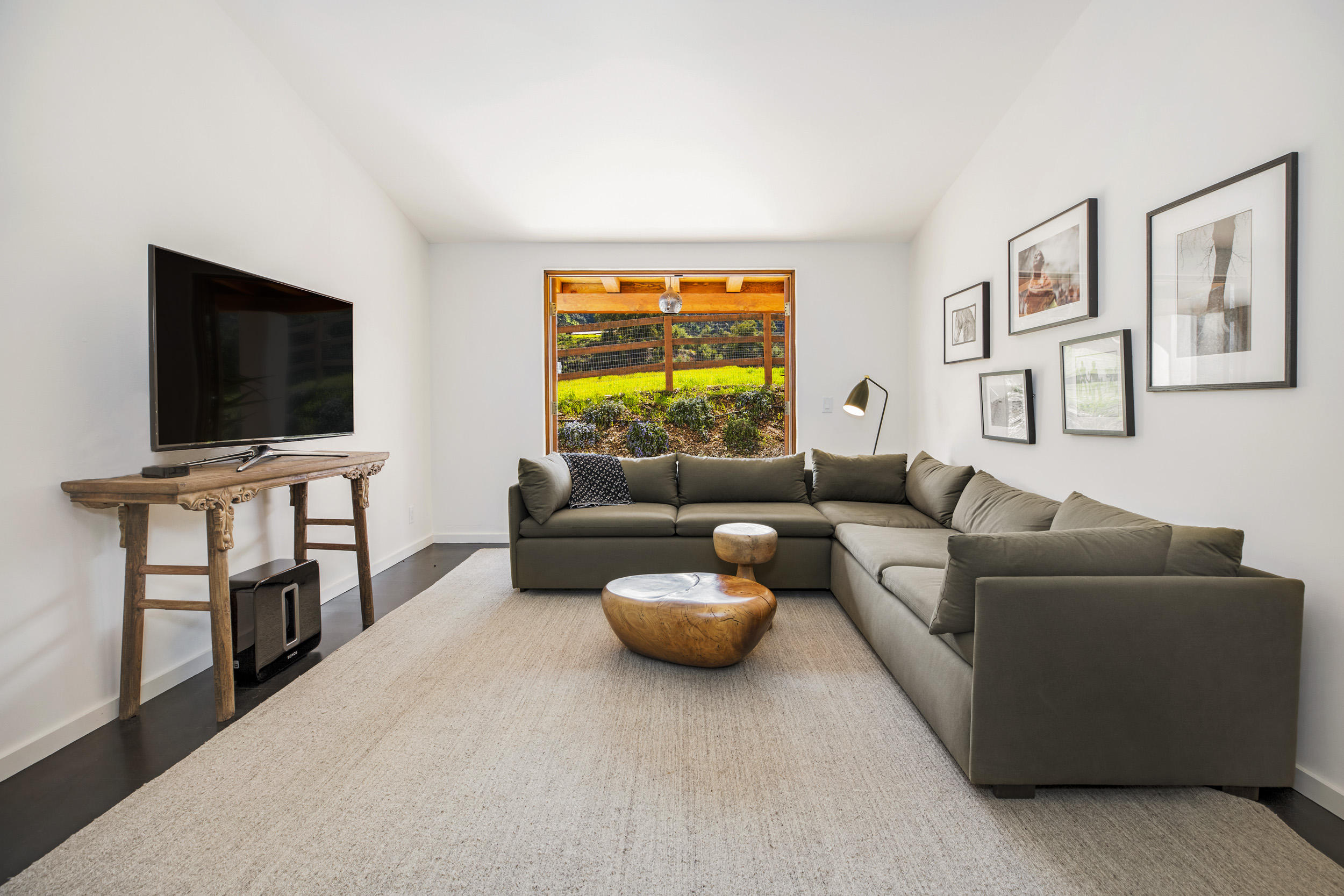 12980 Ojai Road Santa Paula, CA 93060 - Photo 11 of 32 a living room with furniture and a flat screen tv