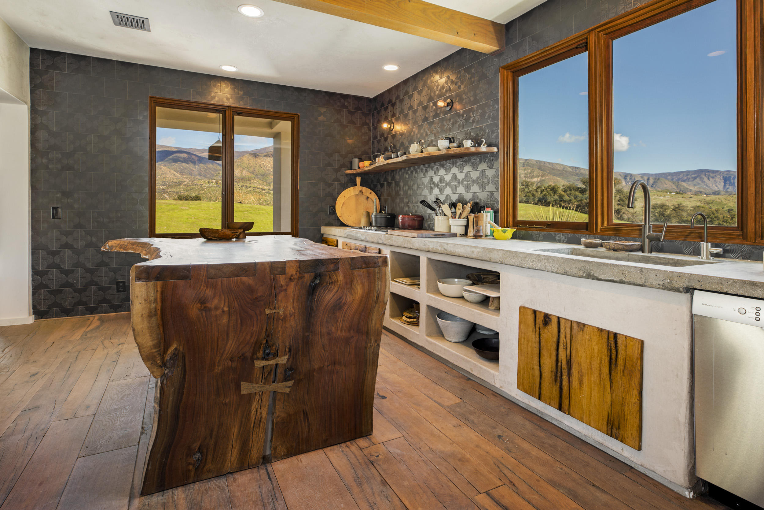 12980 Ojai Road Santa Paula, CA 93060 - Photo 13 of 32 a kitchen with stainless steel appliances granite countertop a stove a sink and a refrigerator