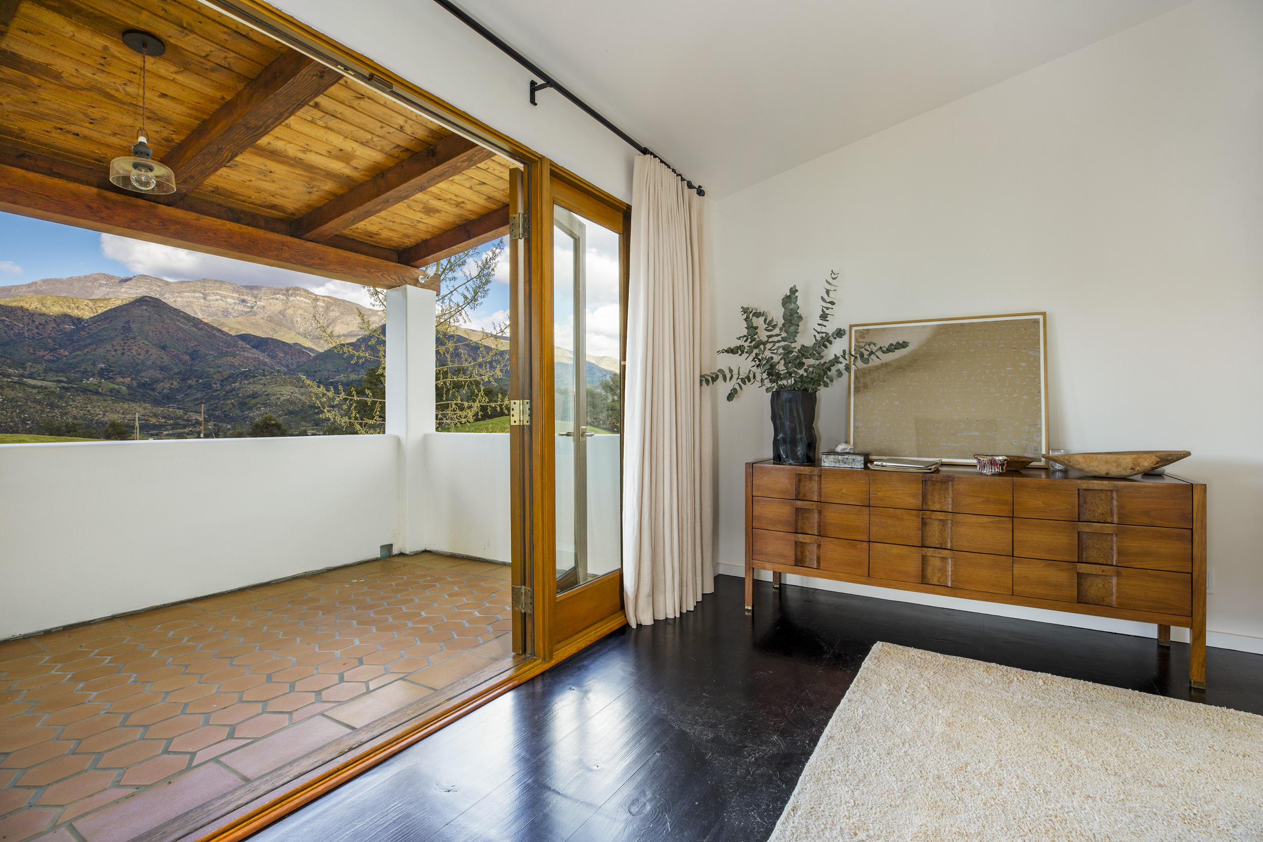 12980 Ojai Road Santa Paula, CA 93060 - Photo 17 of 32 a view of room with window and wooden floor