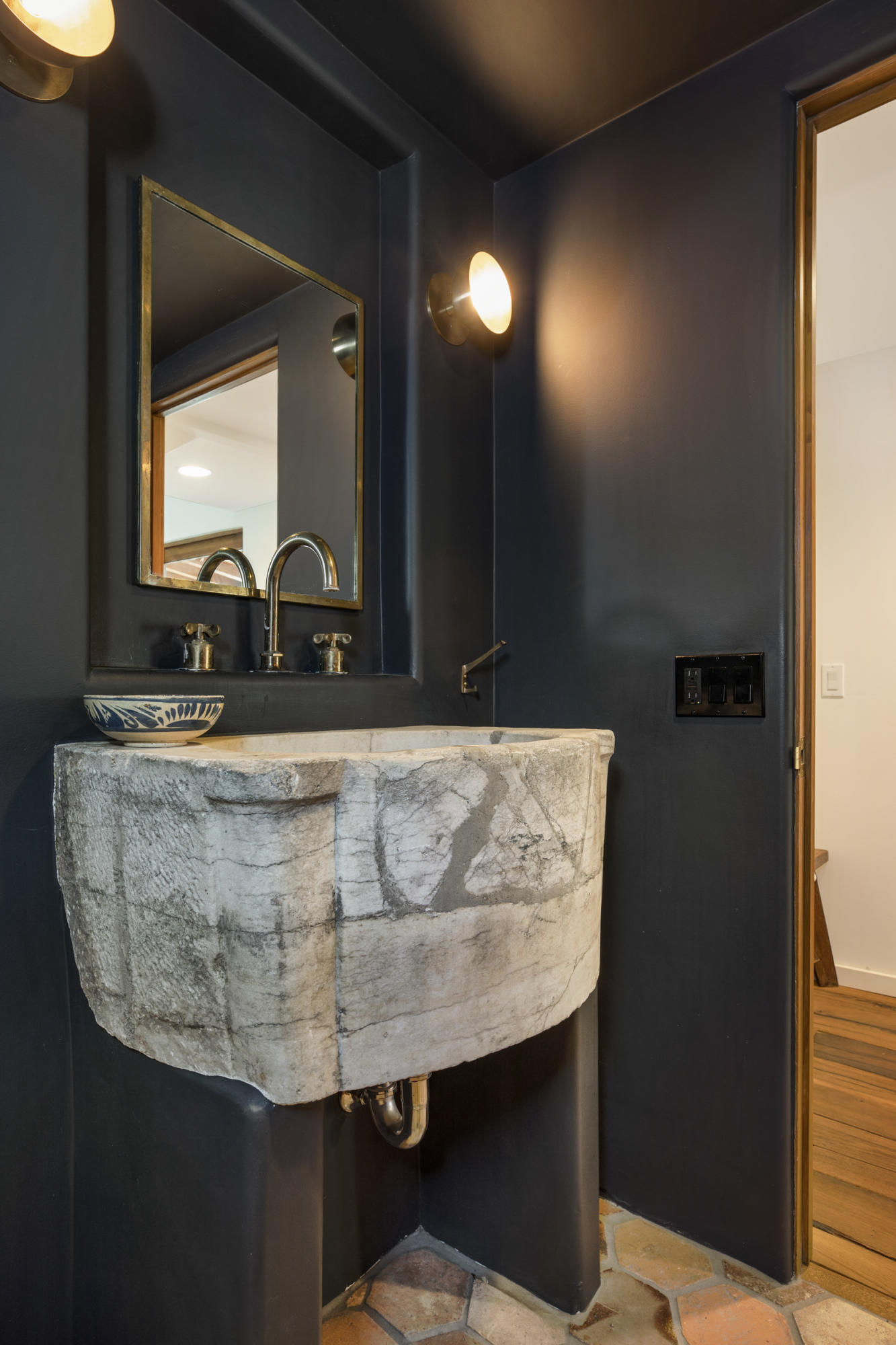 12980 Ojai Road Santa Paula, CA 93060 - Photo 23 of 32 a bathroom with a granite countertop sink a mirror and a vanity