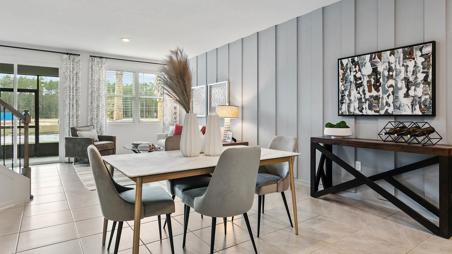 23 Redbud Road Palm Coast, FL 32137 - Photo 9 of 33 a view of a dining room with furniture window and outside view