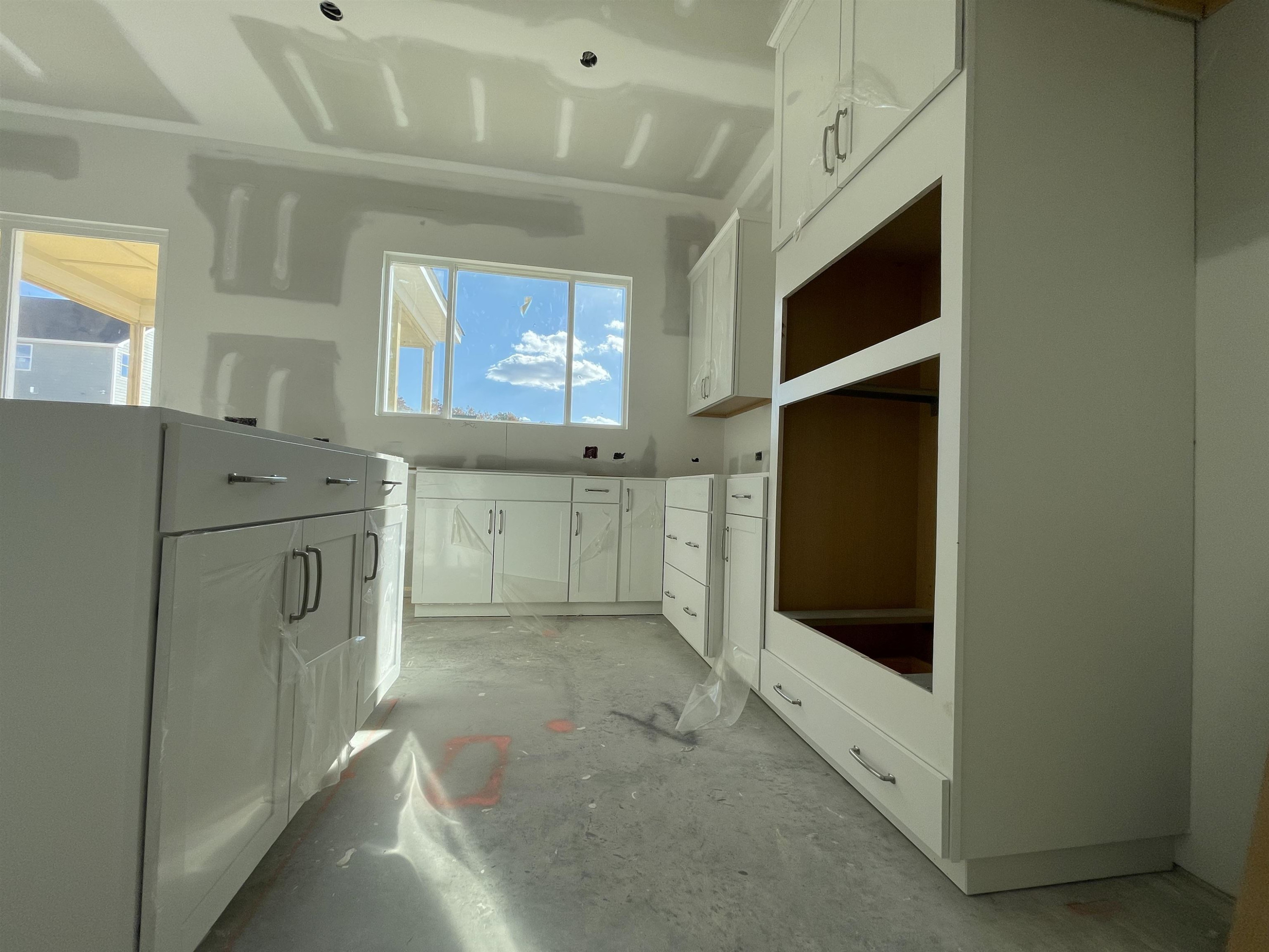 540 Marthas View Way Wake Forest, NC 27587 - Photo 14 of 25 a view of a hallway with washer and dryer