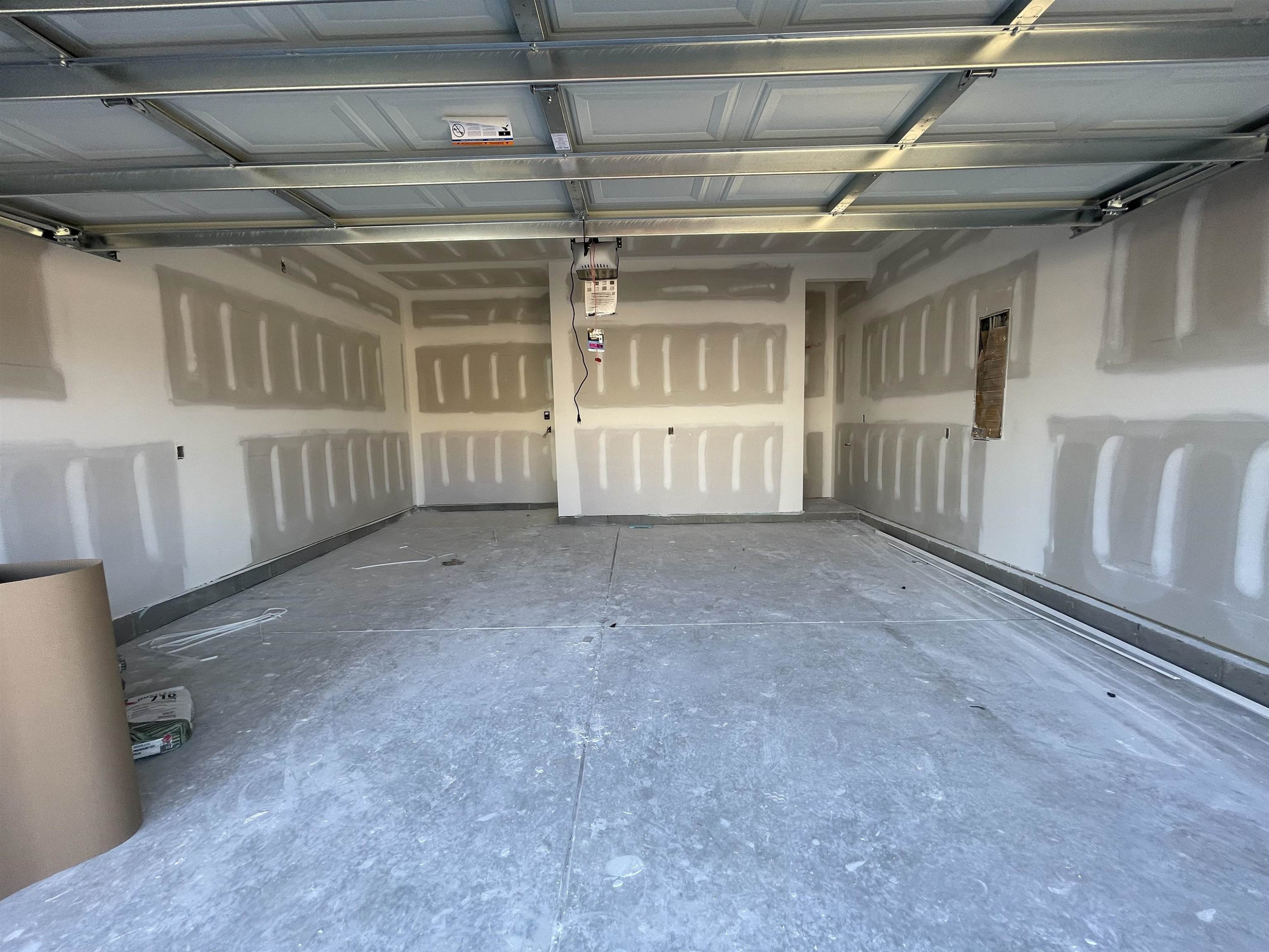 540 Marthas View Way Wake Forest, NC 27587 - Photo 3 of 25 a view of an empty room with wooden walls