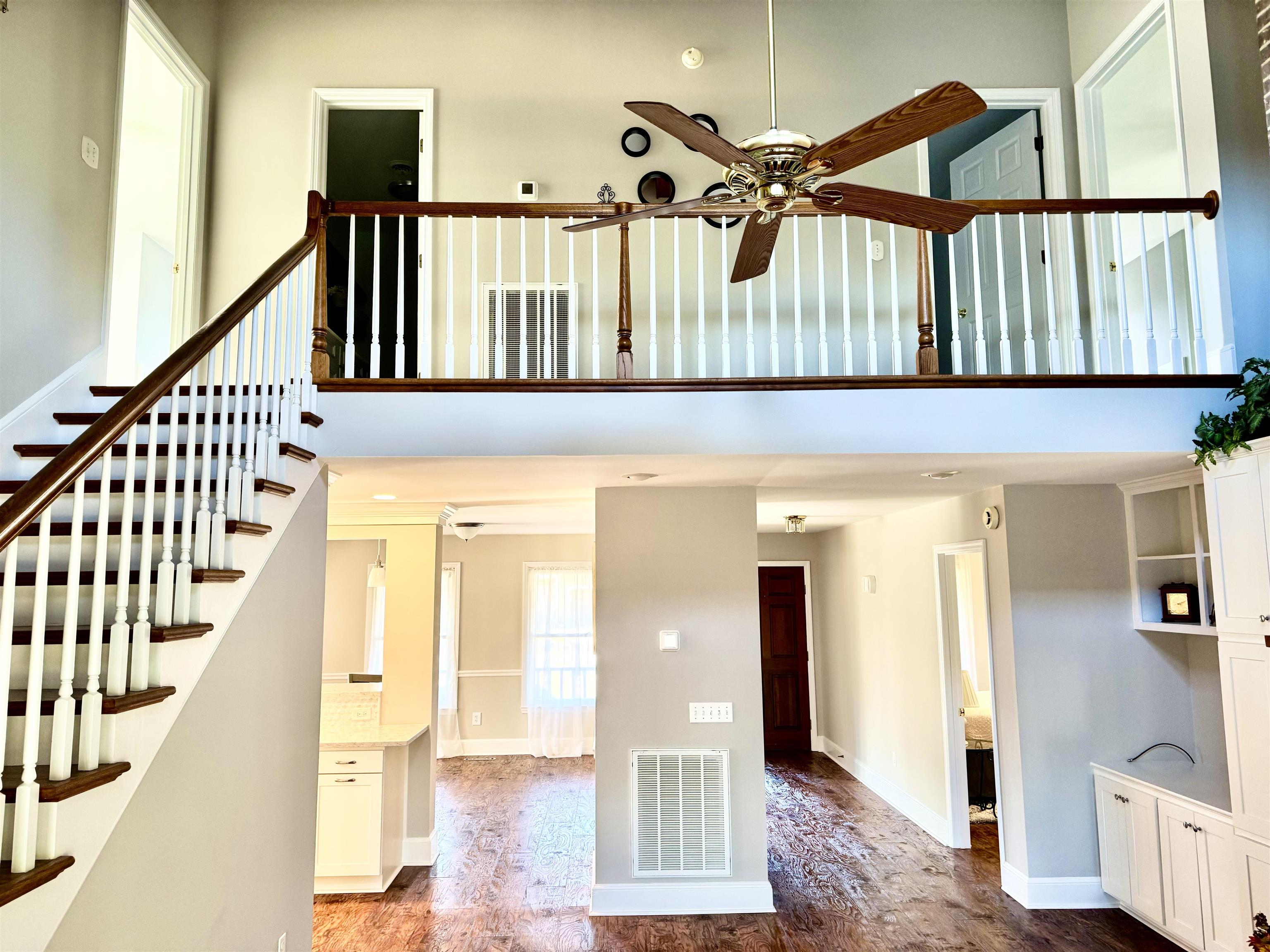 94 John Green Lane Georgetown, SC 29440 - Photo 13 of 35 Interior space with a ceiling fan, wood finished floors, and a high ceiling