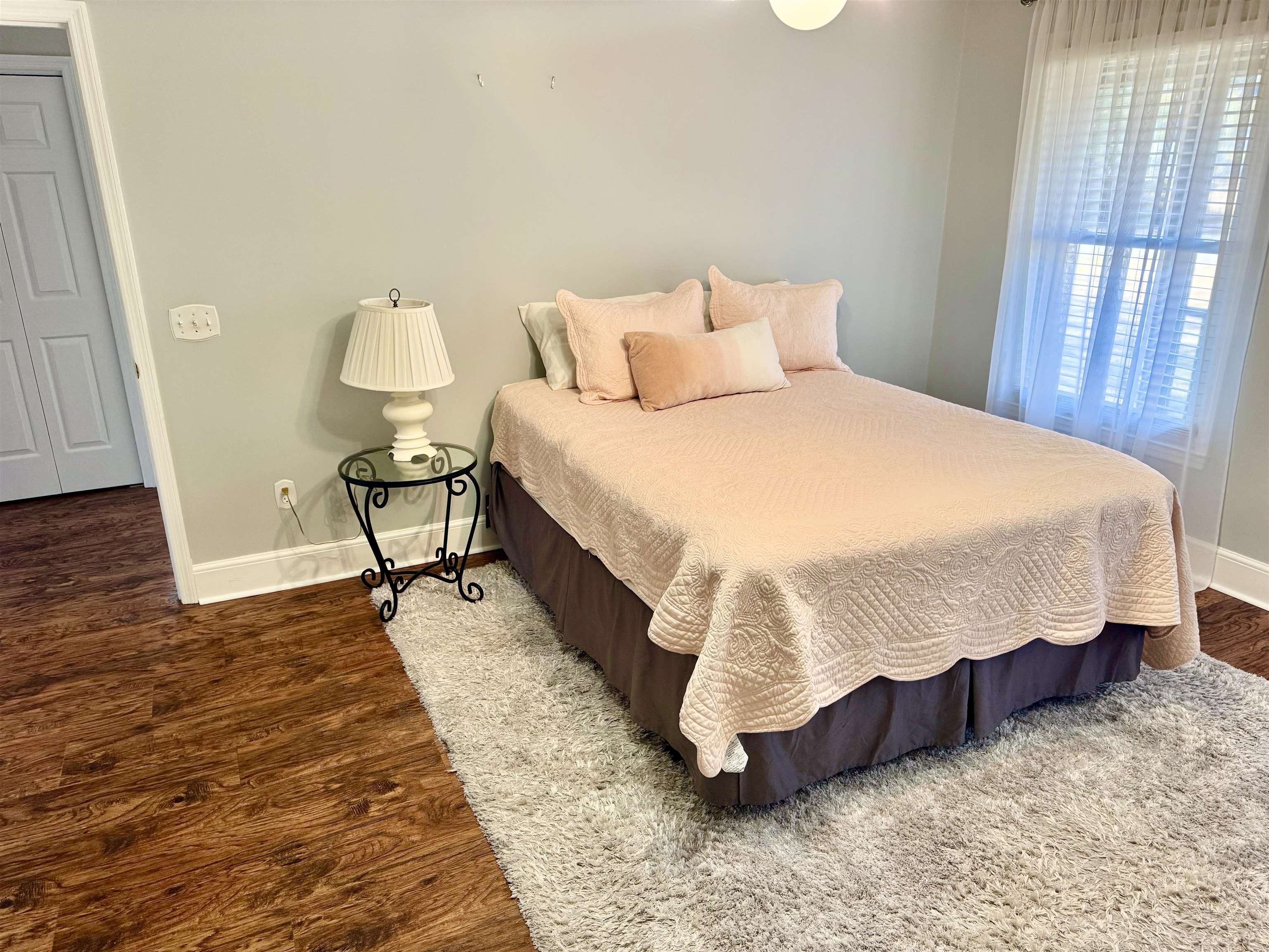 94 John Green Lane Georgetown, SC 29440 - Photo 17 of 35 Bedroom featuring baseboards and dark wood-type flooring
