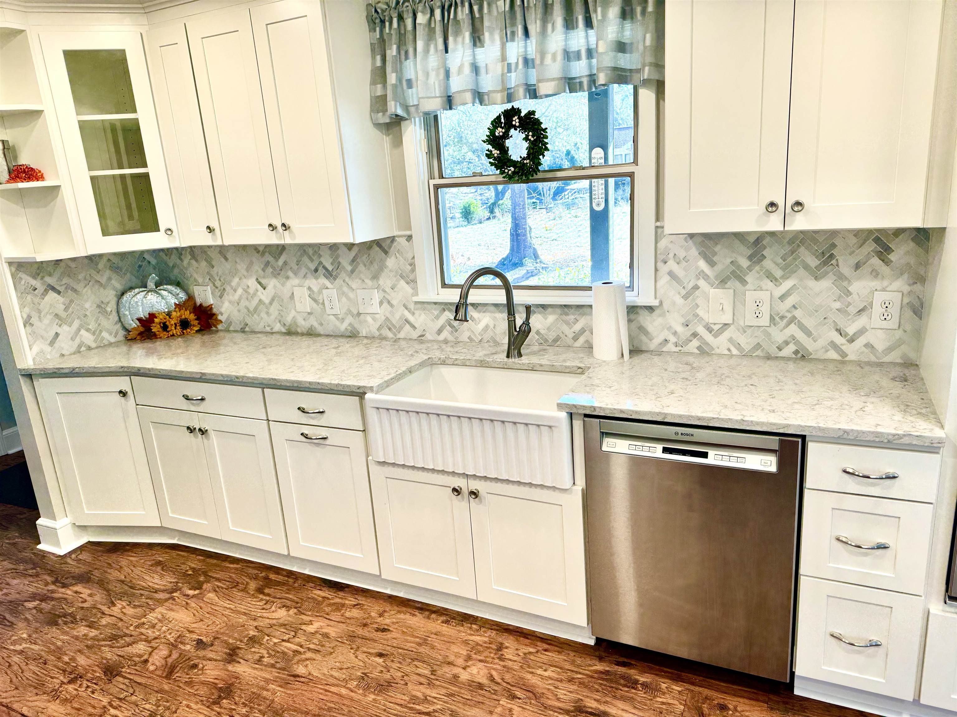 94 John Green Lane Georgetown, SC 29440 - Photo 2 of 35 Kitchen featuring light stone counters, glass insert cabinets, dishwasher, white cabinetry, and open shelves