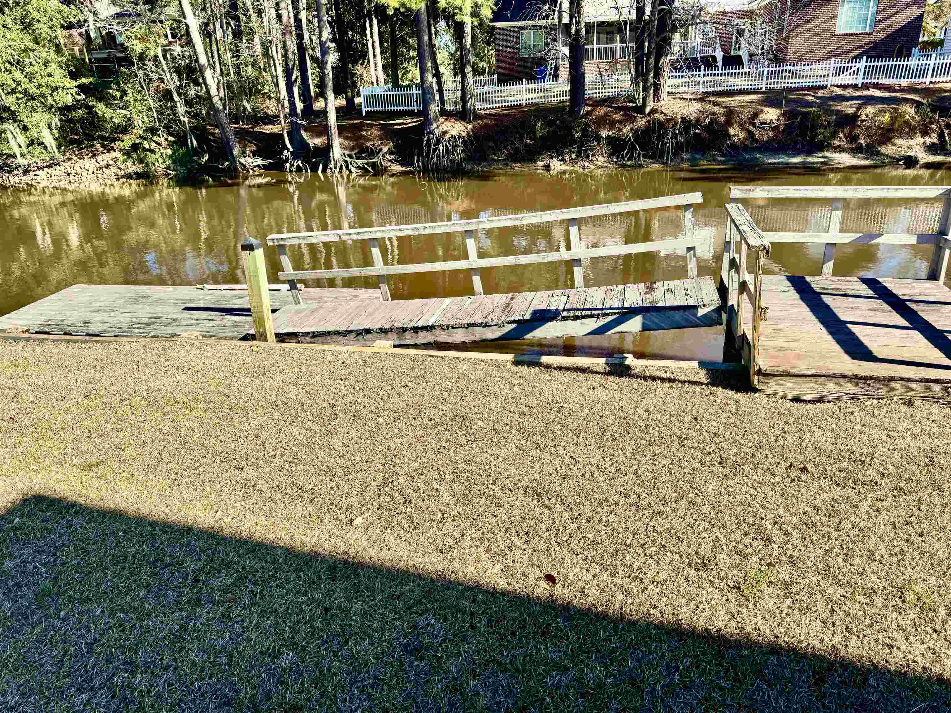 94 John Green Lane Georgetown, SC 29440 - Photo 26 of 35 Surrounding community featuring a dock and a water view
