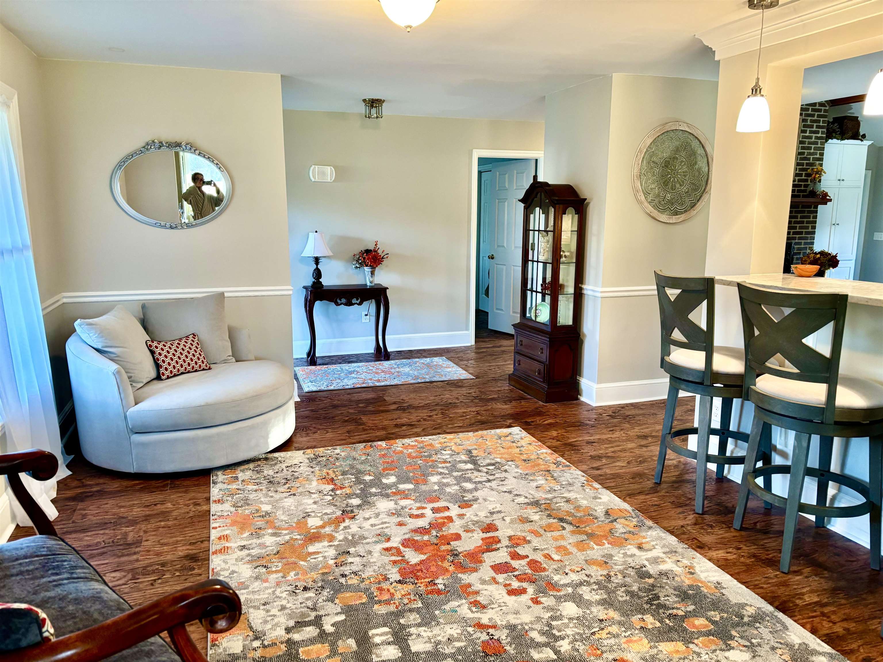 94 John Green Lane Georgetown, SC 29440 - Photo 5 of 35 Living area with dark wood finished floors and baseboards