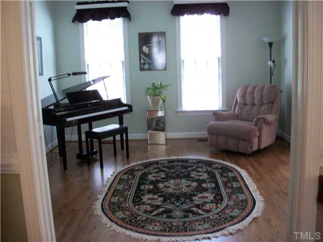 5209 Coffee Tree Drive Raleigh, NC 27613 - Photo 9 of 25 View of the formal living room from family room Living Room