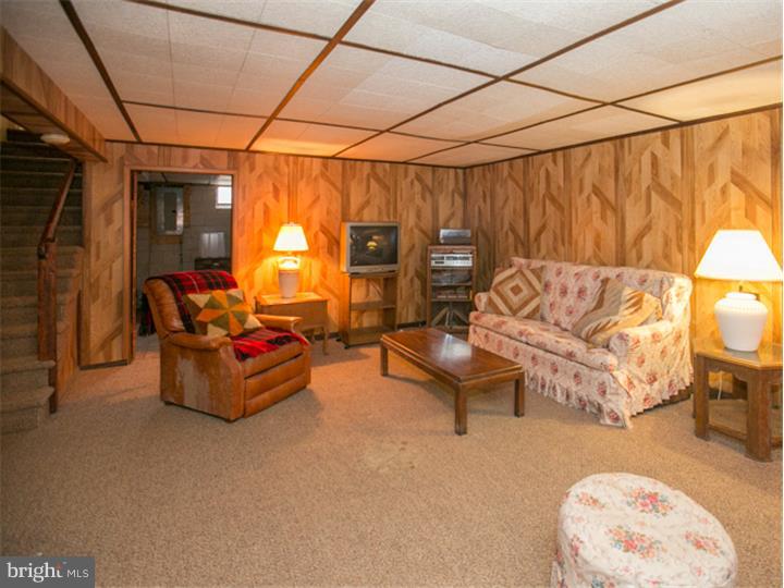 5 Evergreen Road Stratford, NJ 08084 - Photo 13 of 18 a living room with furniture and a window