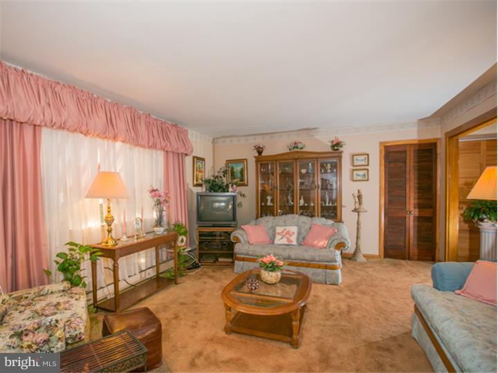 5 Evergreen Road Stratford, NJ 08084 - Photo 3 of 18 a bedroom with furniture and large window