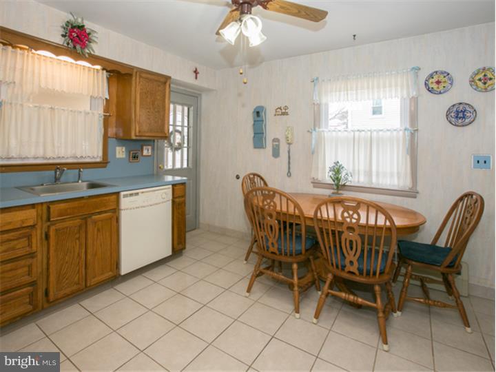 5 Evergreen Road Stratford, NJ 08084 - Photo 7 of 18 a dining room with granite countertop furniture and window