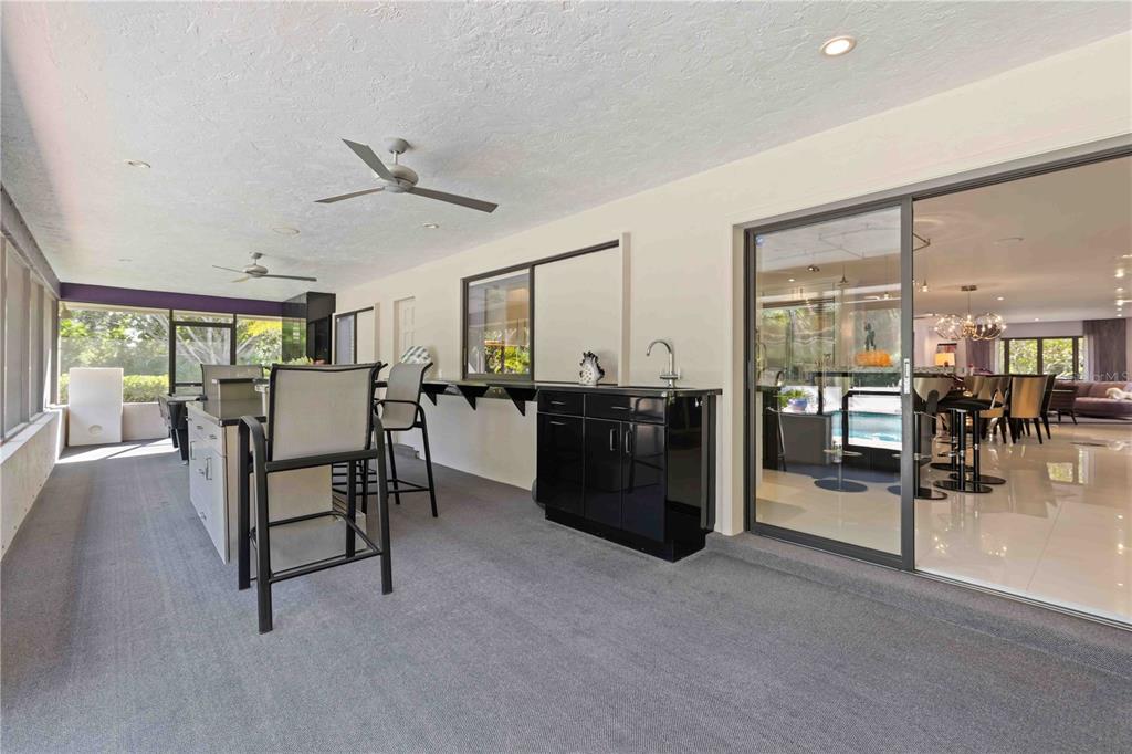 505 Lyons Bay Road Nokomis, FL 34275 - Photo 28 of 57 a view of a livingroom with furniture and a table